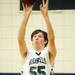 Greenhills senior Michael Wright takes a three-point shot during the second half at Greenhills on Thursday. Melanie Maxwell I AnnArbor.com